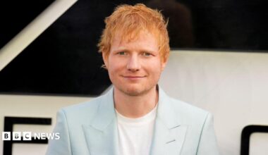 ed sheeran in a pale blue suit