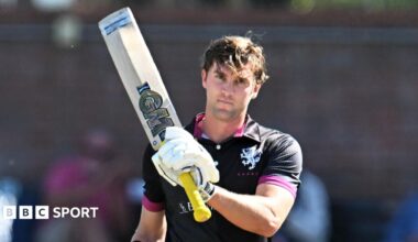 Somerset batter Tom Lammonby raises his bat after scoring a century in the Metro Bank One Day Cup win over Surrey at Taunton