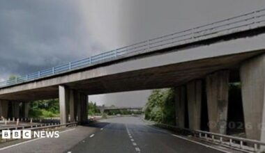 A motorway bridge over an empty M67