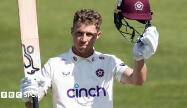 Nathan McSweeney raises his bat