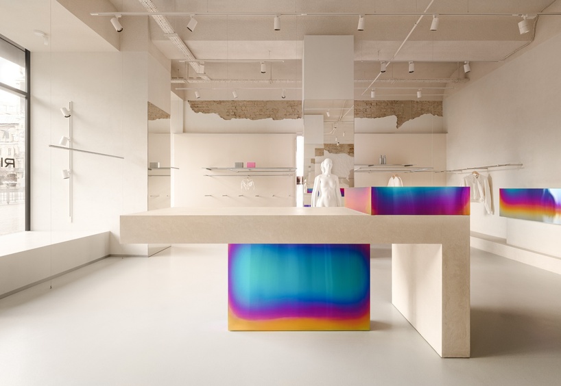 iridescent metal and textured plaster shape rikky hype showroom in kyiv - 1