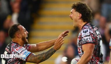 Robbie Mulhern (right) celebrating with team-mate Liam Horne after scoring a try for Leigh Leopards