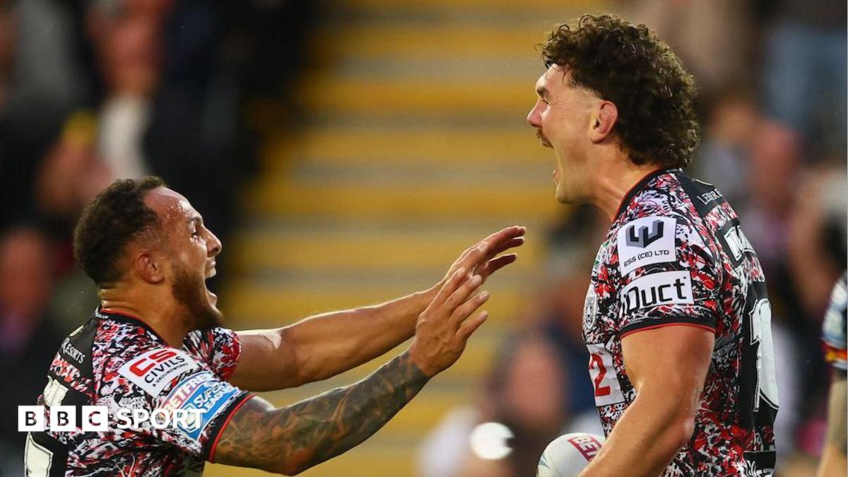 Robbie Mulhern (right) celebrating with team-mate Liam Horne after scoring a try for Leigh Leopards