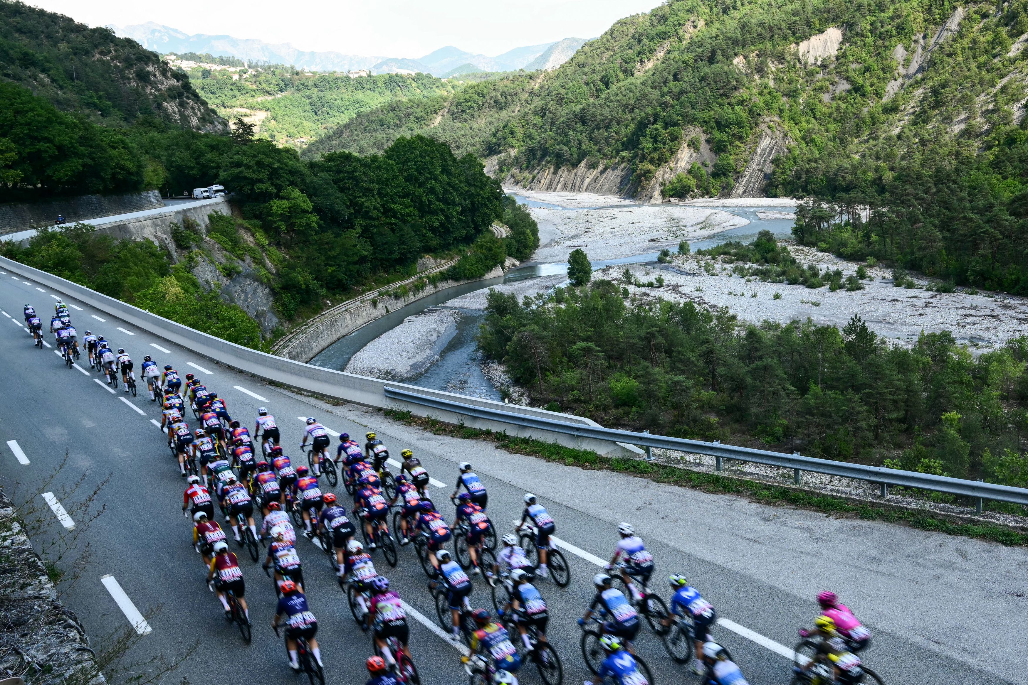 The pack rides during the 8th (out of 9) stage of the fifth edition of the Women's Tour de France cycling race, 171.9 km from Sisteron to Nice, southeastern France on August 8, 2026. (Photo by NICOLAS TUCAT / AFP via Getty Images)