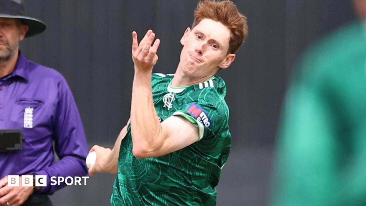 James Hayes is bowling a ball while playing in the green shirt of Nottinghamshire.