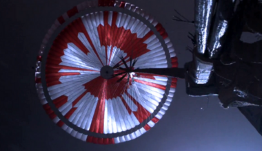 The stripes on Perseverance's parachute were mostly there so engineers could see how the canopy was oriented, but the pattern also hid a message in binary, and the internet decoded it within hours of the landing — a motto, and a set of coordinates pointing at a spot on Earth