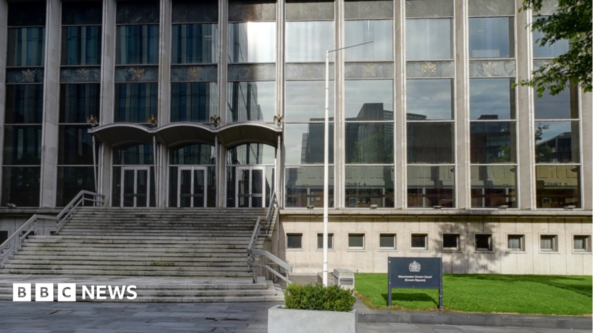 Manchester Crown court. A grey building with rows of steps leading to the entrance.