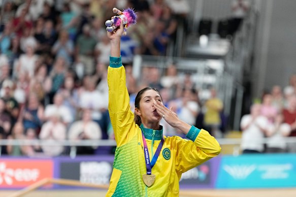 Georgia Baker celebrates during the medal ceremony of the women’s 10km scratch race final on Friday.