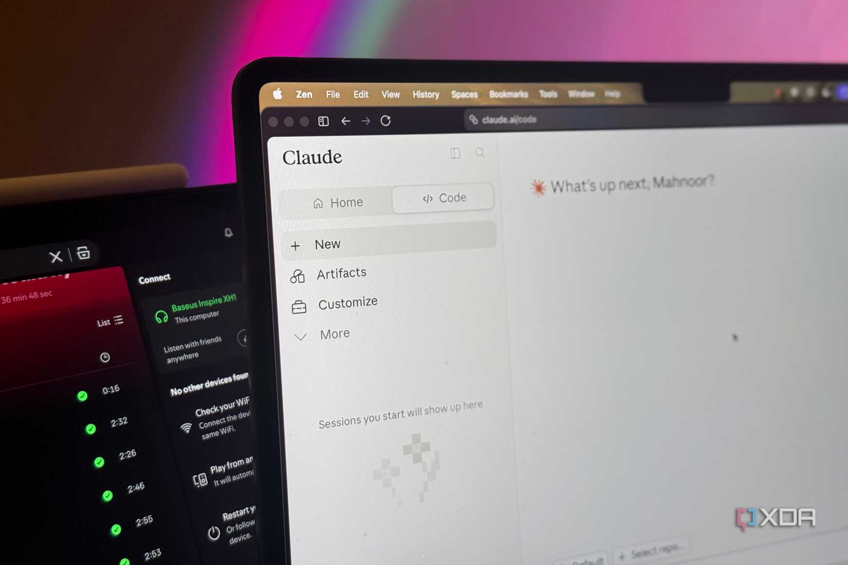 Claude Code web on MacBook with Spotify in background