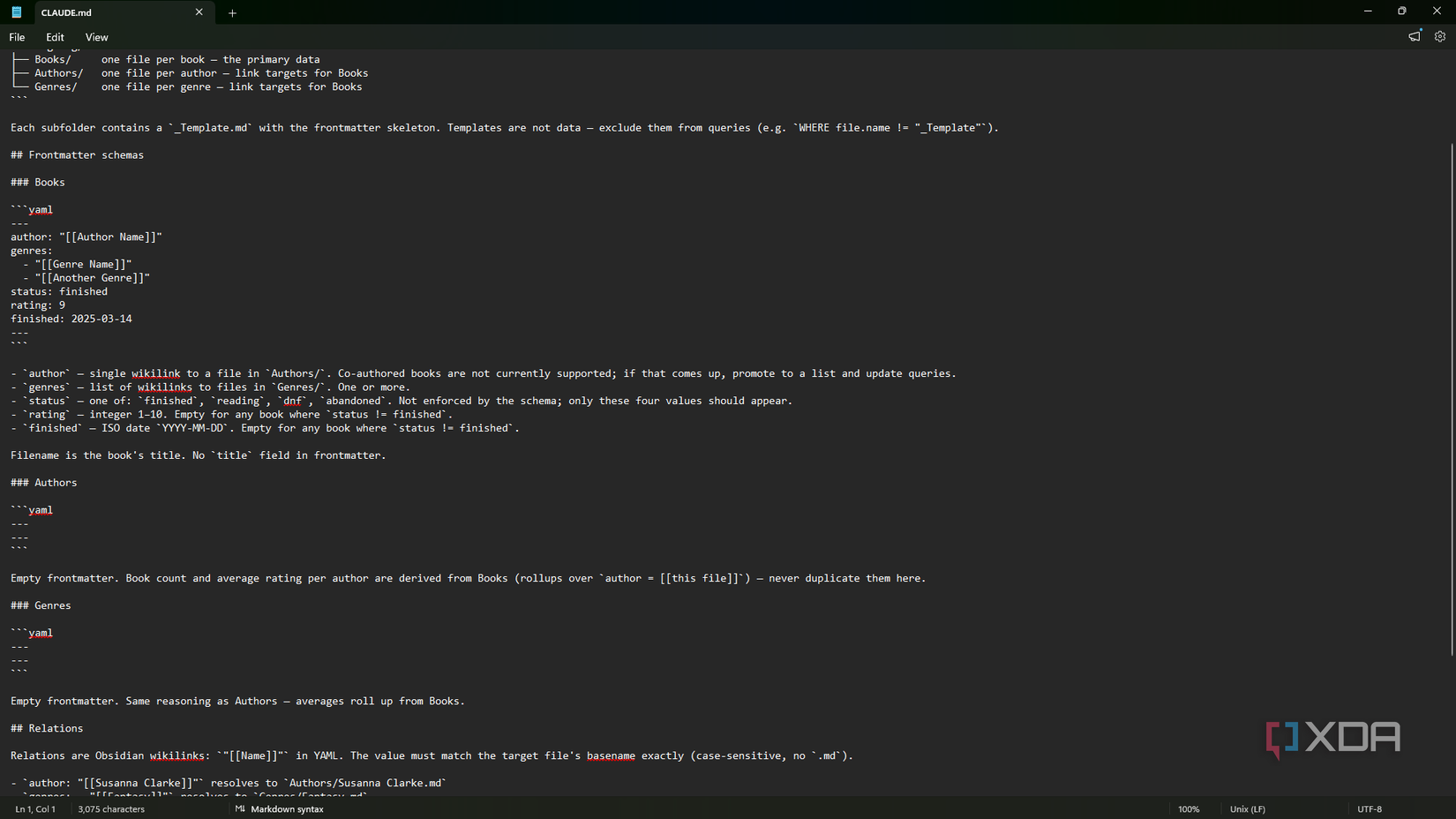CLAUDE.md open in Notepad showing reading log frontmatter schemas