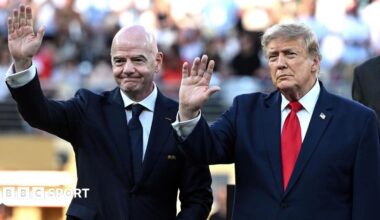 Fifa president Gianni Infantino and US President Donald Trump waving
