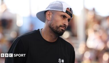 Nick Kyrgios watches on during January's Australian Open