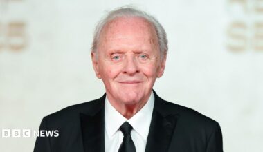 Sir Anthony Hopkins in a dark suit