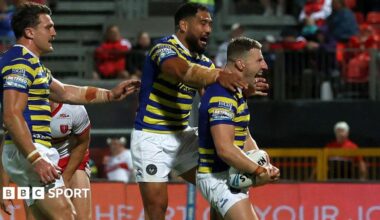 George Williams (right) celebrates scoring for Warrington against Hull KR