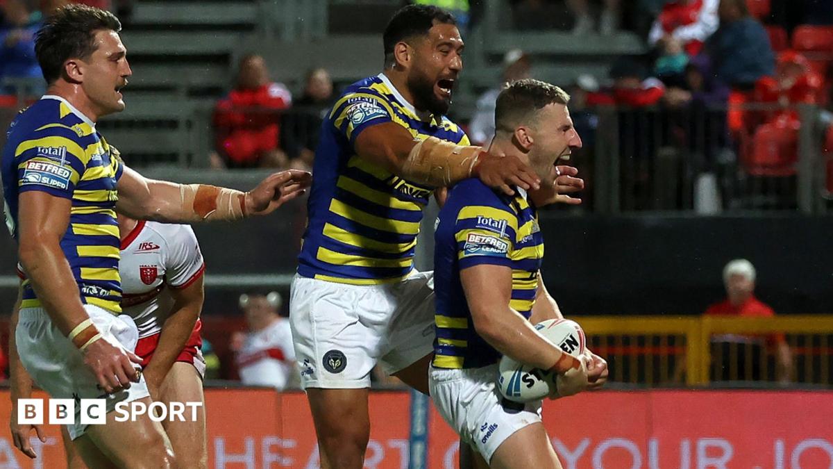 George Williams (right) celebrates scoring for Warrington against Hull KR