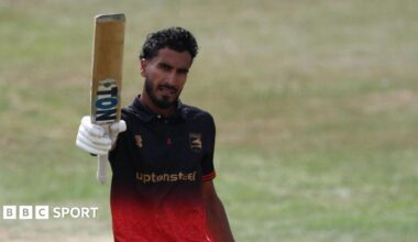 Hamza Shaikh holds his bat up for Leicestershire after scoring a century against Notts Outlaw in the One-Day Cup semi-final