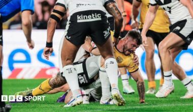 Liam Hood burrows his way over the line to score Castleford's winning try in their 18-14 success at Hull FC.