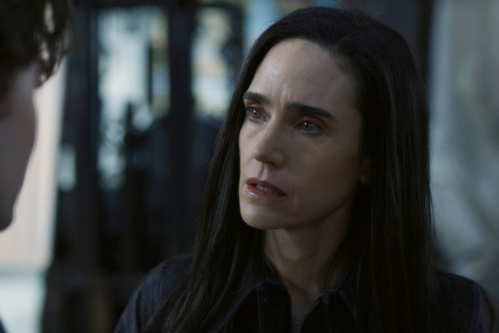 jennifer-connelly-dark-matter Jennifer Connelly stars in Dark Matter season 2; in this scene, her character looks distressed while receiving some difficult news