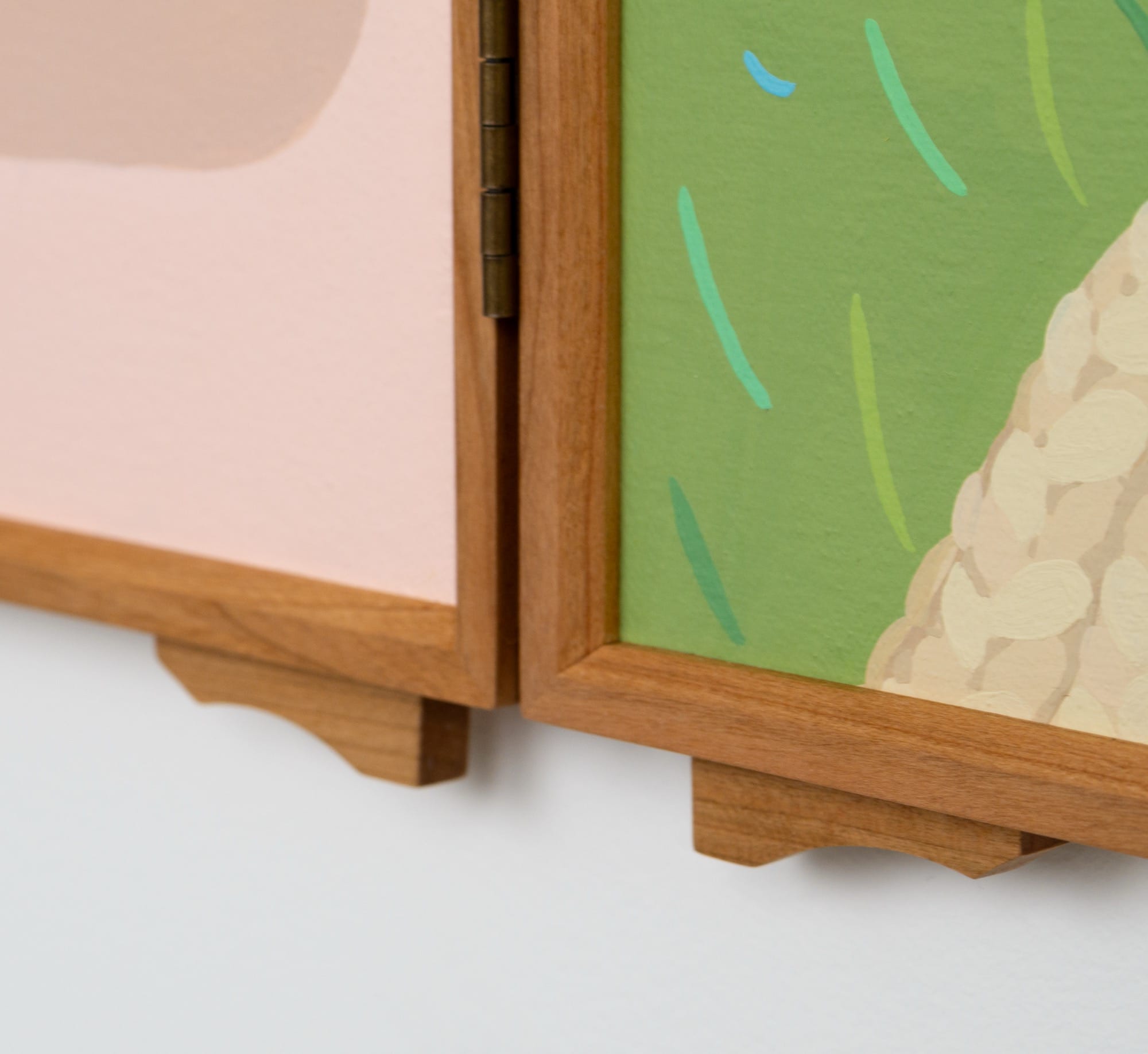 a detail image of small curved details on a wood frame