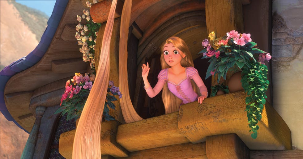 Mandy Moore voices Rapunzel, Tangled mandy moore voices rapunzel standing at a wooden balcony adorned with flowers in tangled