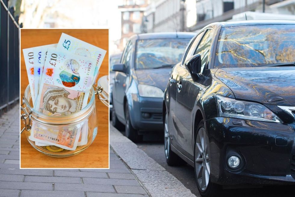 Pot of money and cars parked on road