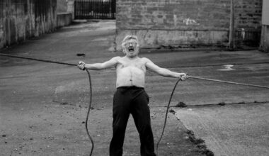 Man holding ropes aggressively