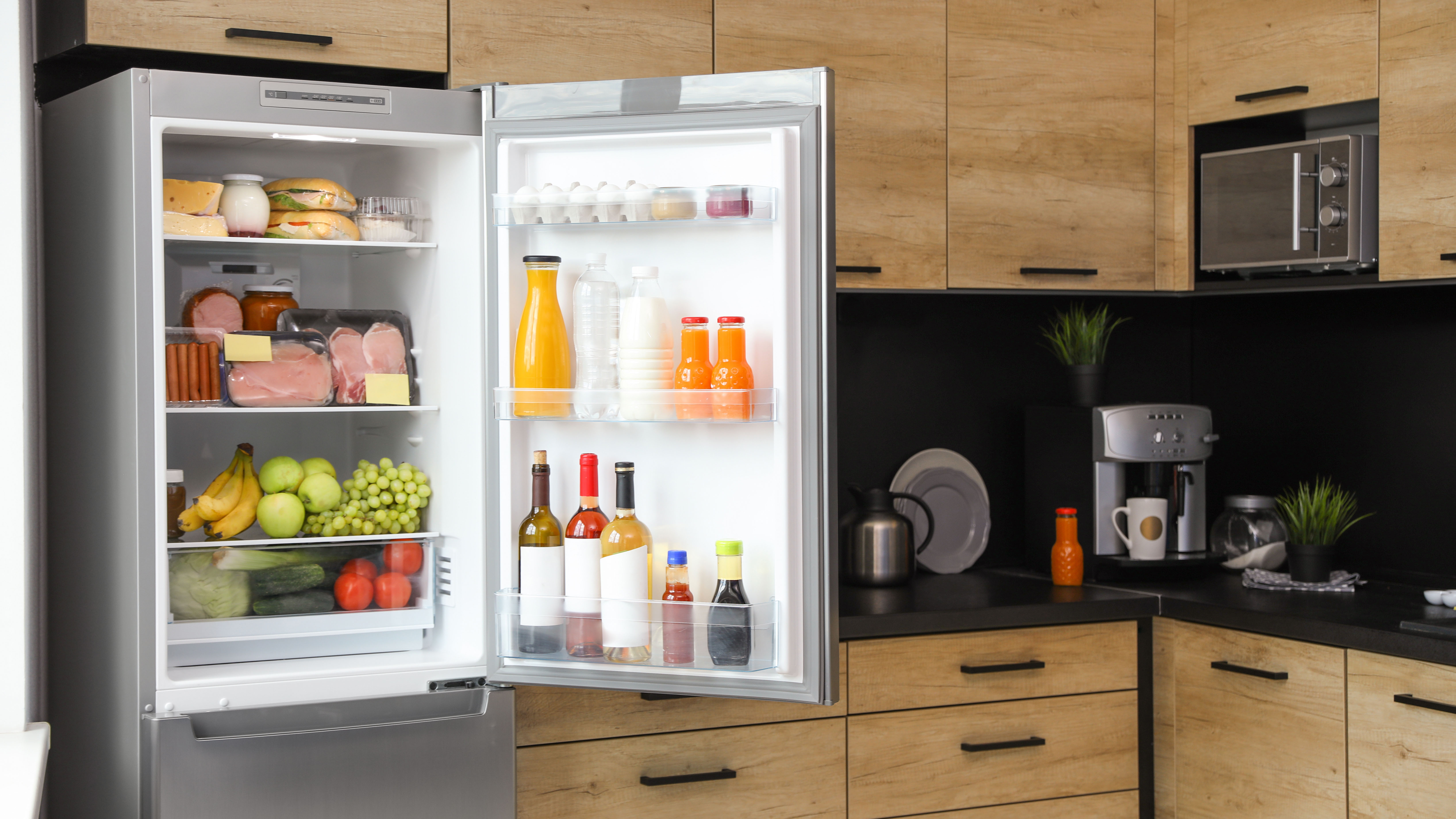 Full fridge in a kitchen.