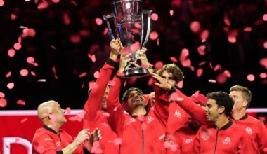 Team World's Taylor Fritz of the USA lifts the 2025 Laver Cup after defeating Carlos Alcaraz's Team Europe