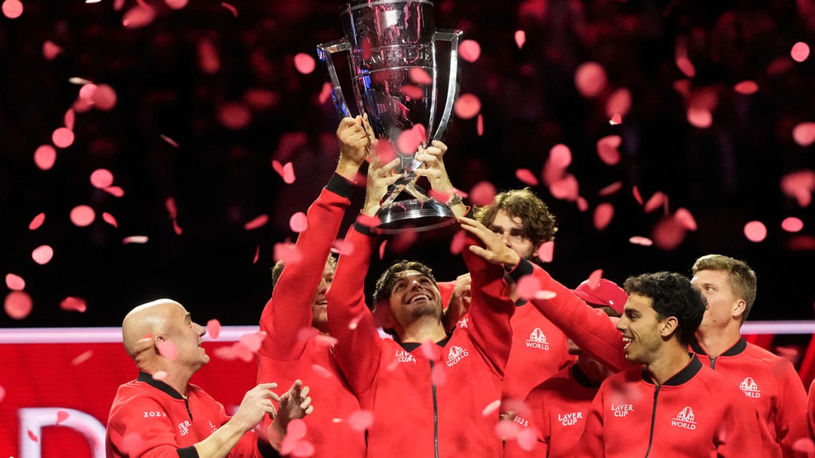 Team World's Taylor Fritz of the USA lifts the 2025 Laver Cup after defeating Carlos Alcaraz's Team Europe