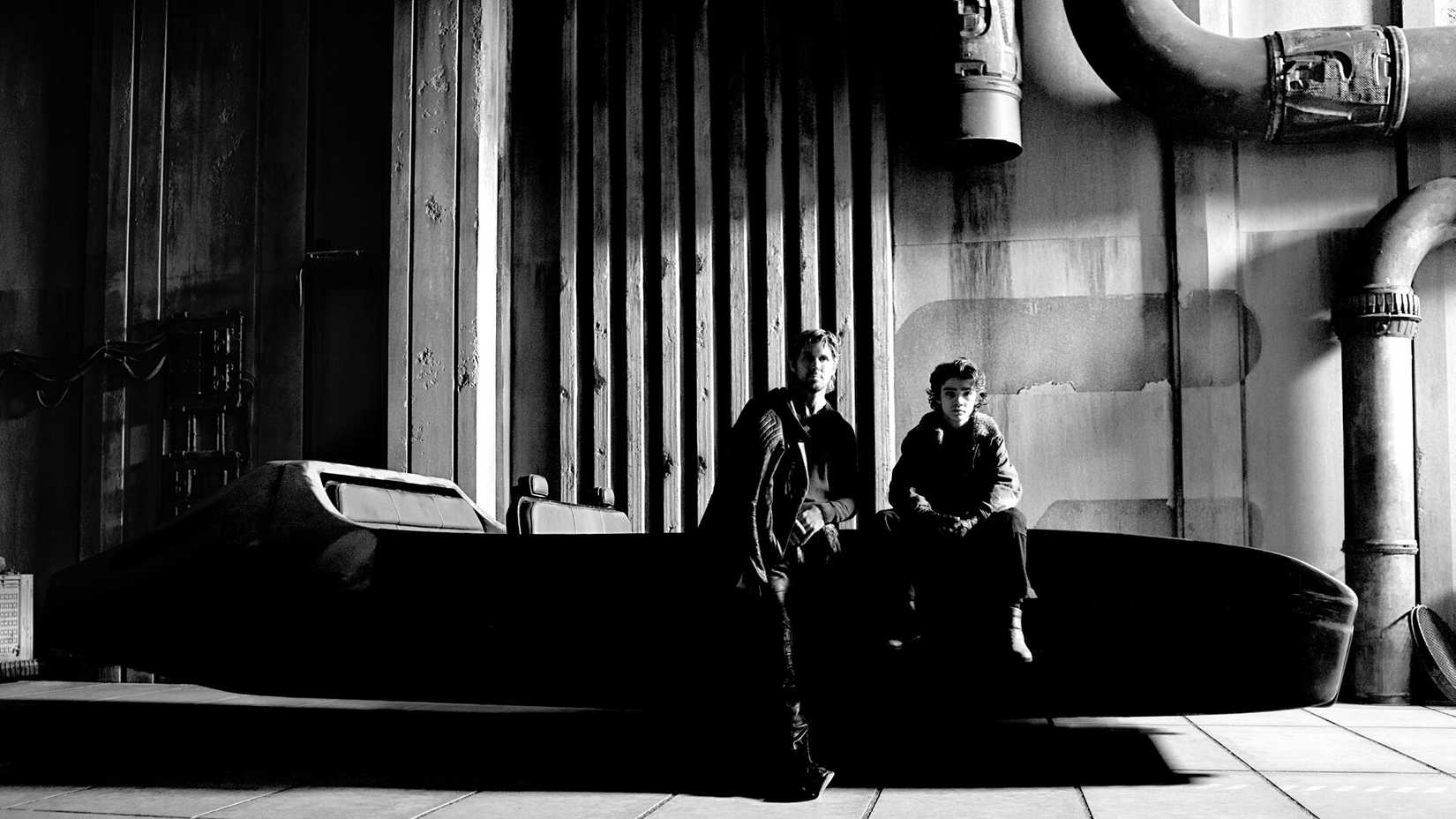 Ryan Gosling and Flynn Gray sit on a landspeeder in a set photo from Star Wars: Starfighter