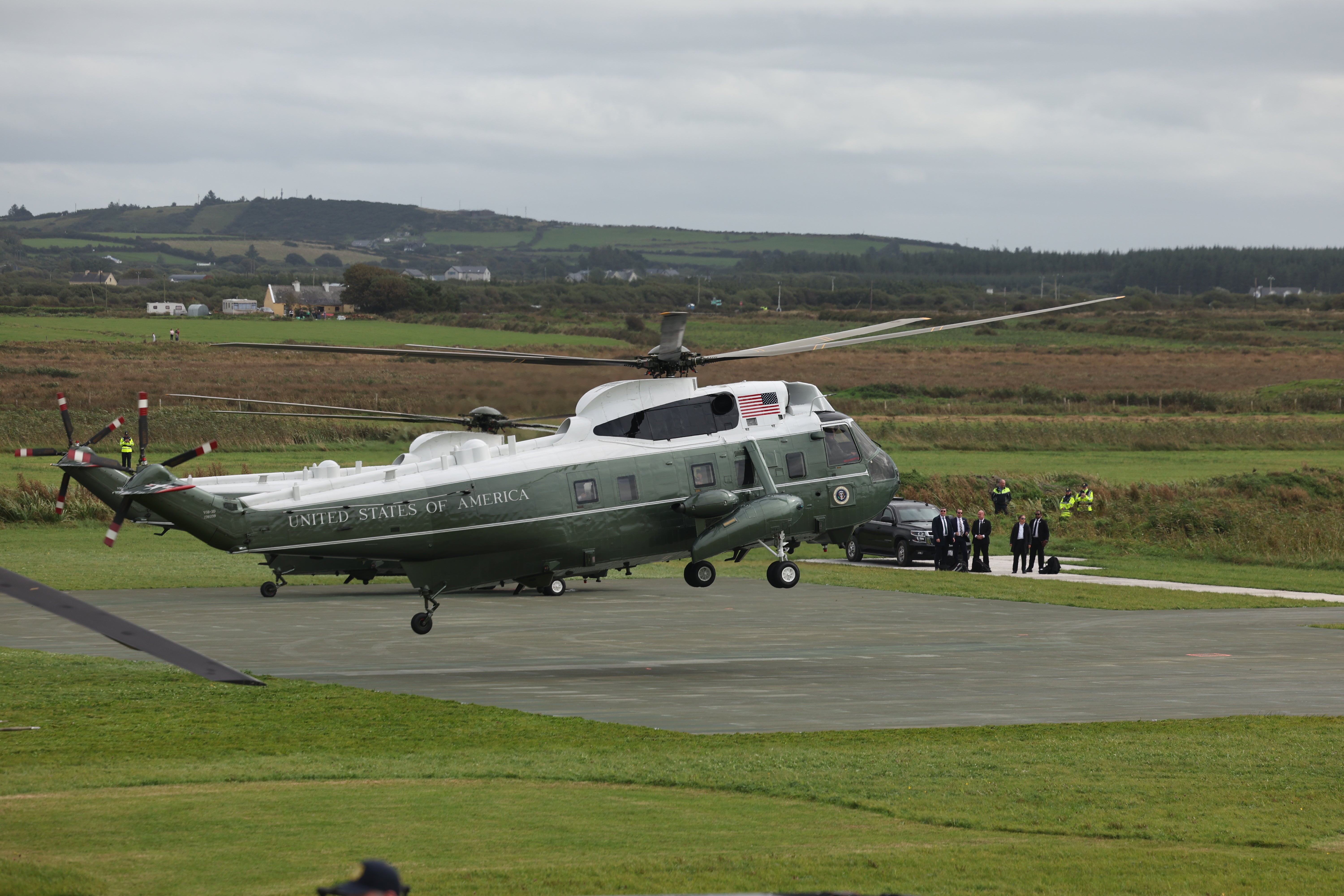 Donald Trump lands in Marine One to attend the Irish Open at the Trump International Golf Links & Hotel (Damien Eagers/PA)
