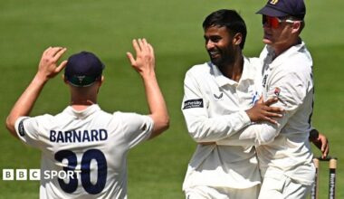India Test spinner Manav Suthar is congratulated by county captain Ed Barnard after taking another wicket for Warwickshre