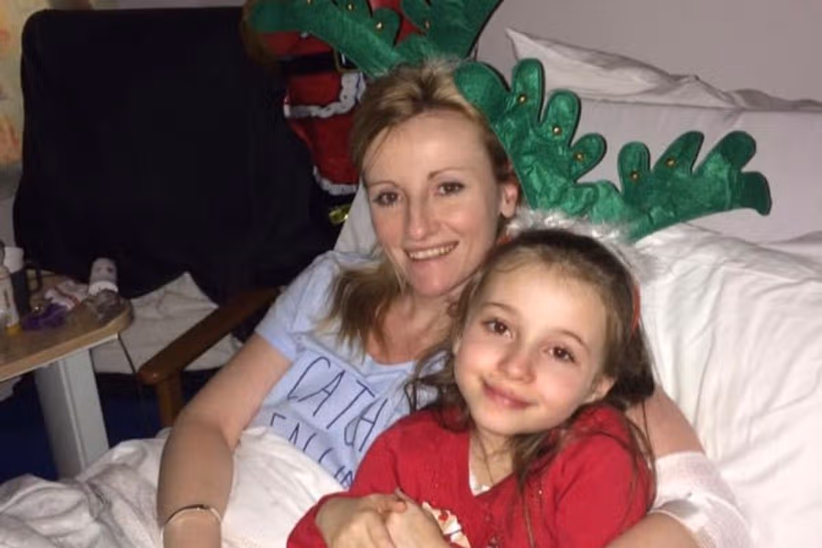 Rebecca Lewis and her daughter Sian in hospital at Christmas in 2016