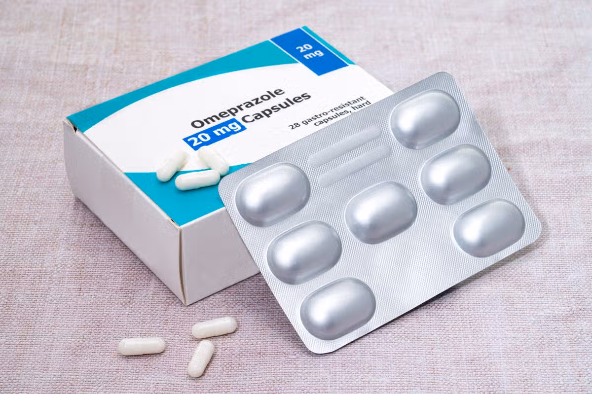 A box and blister pack of generic  Omeprazole pills