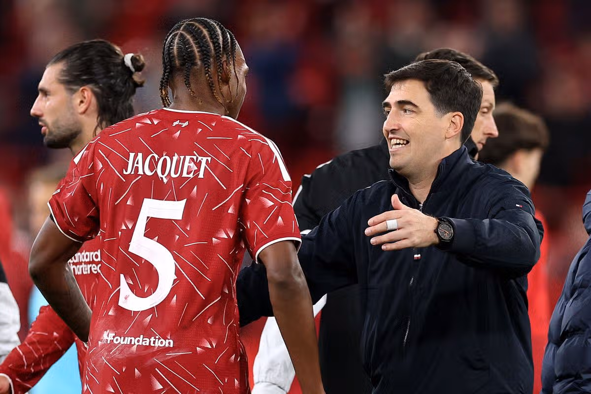 Liverpool head coach Andoni Iraola with Jeremy Jacquet after the UEFA Champions League match against Atletico Madrid at Anfield on September 9 2026 