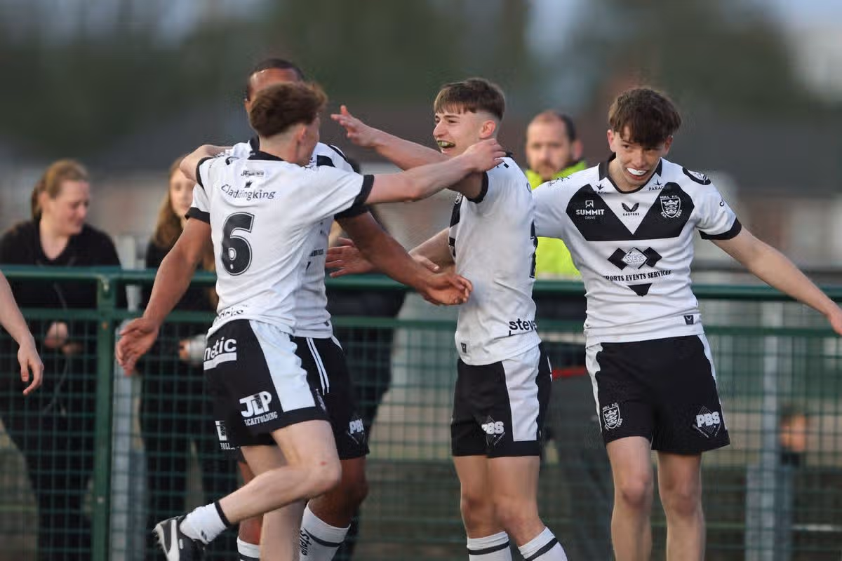 Hull FC scholarship players celebrate a try.