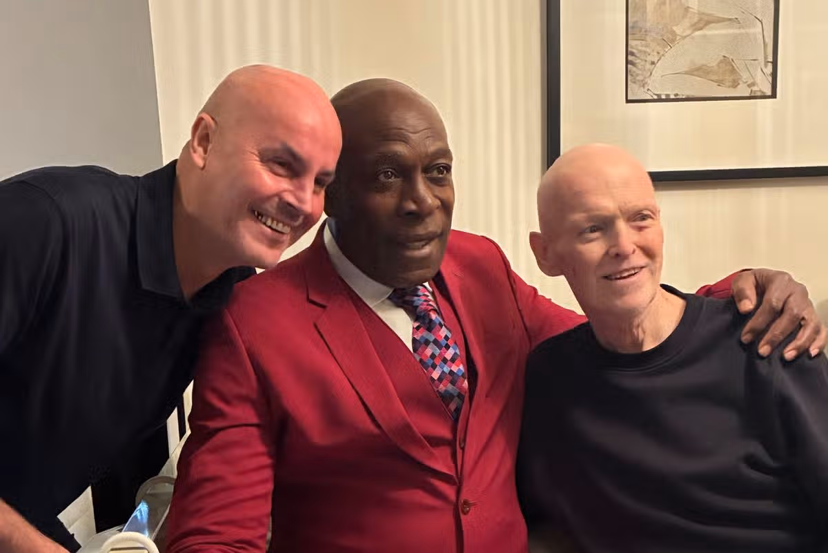 Dan Horrocks (left), Frank Bruno in his 'flamboyant red suit' (middle) and John Cornelius Shortall (right)