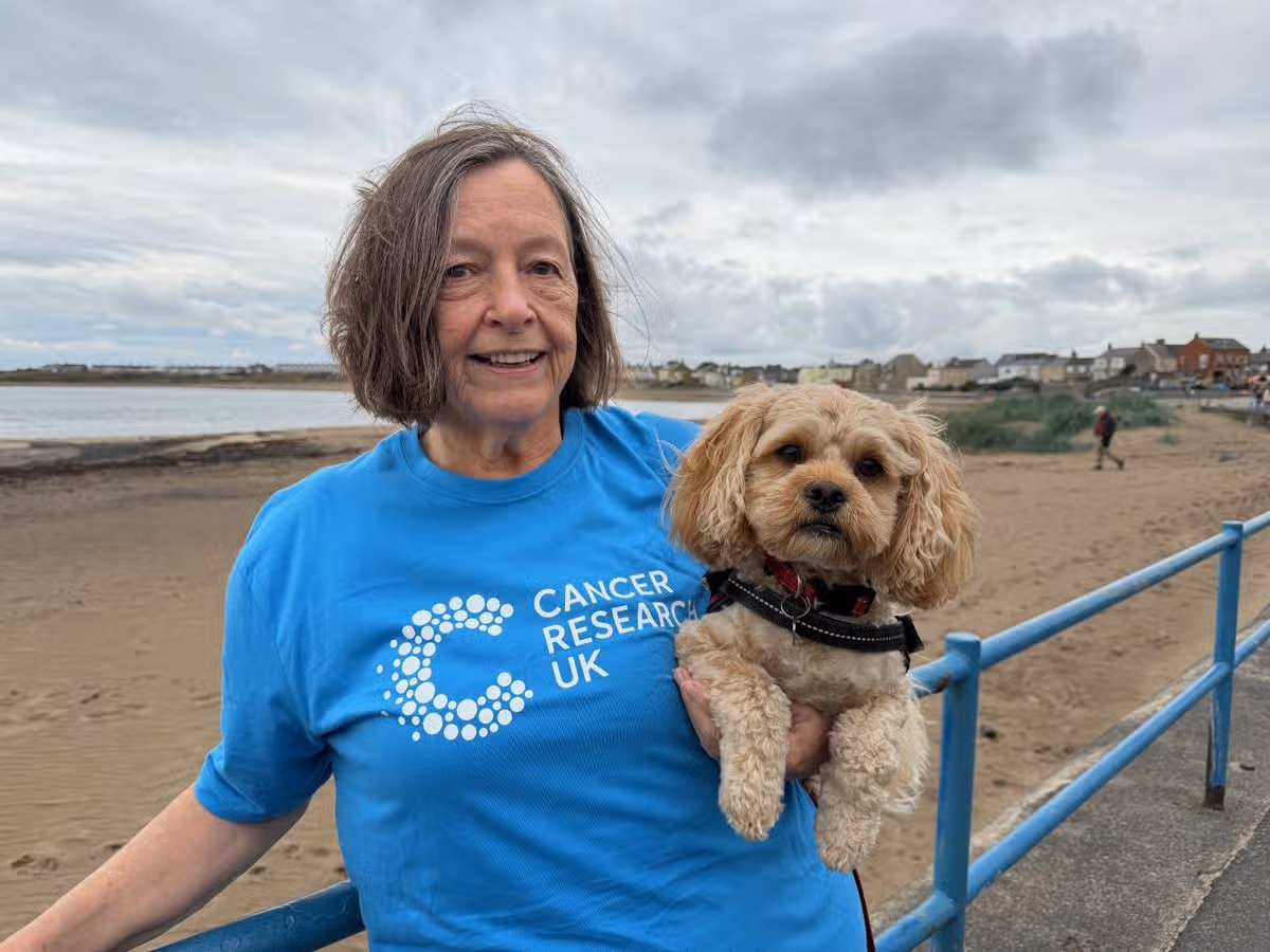 Mel Jackson with dog Teddy at Newbiggin promenade