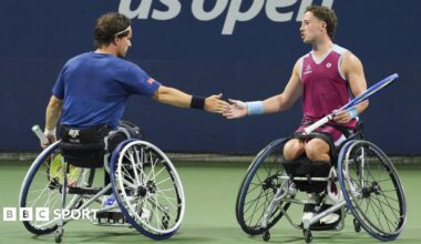 Great Britain's Alfie Hewett and Gordon Reid slap hands