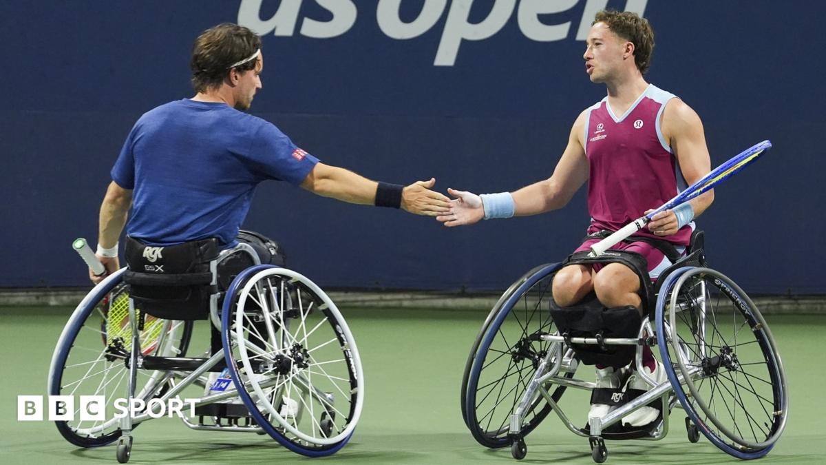 Great Britain's Alfie Hewett and Gordon Reid slap hands