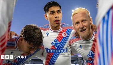 Dario Osorio in a Crystal Palace huddle