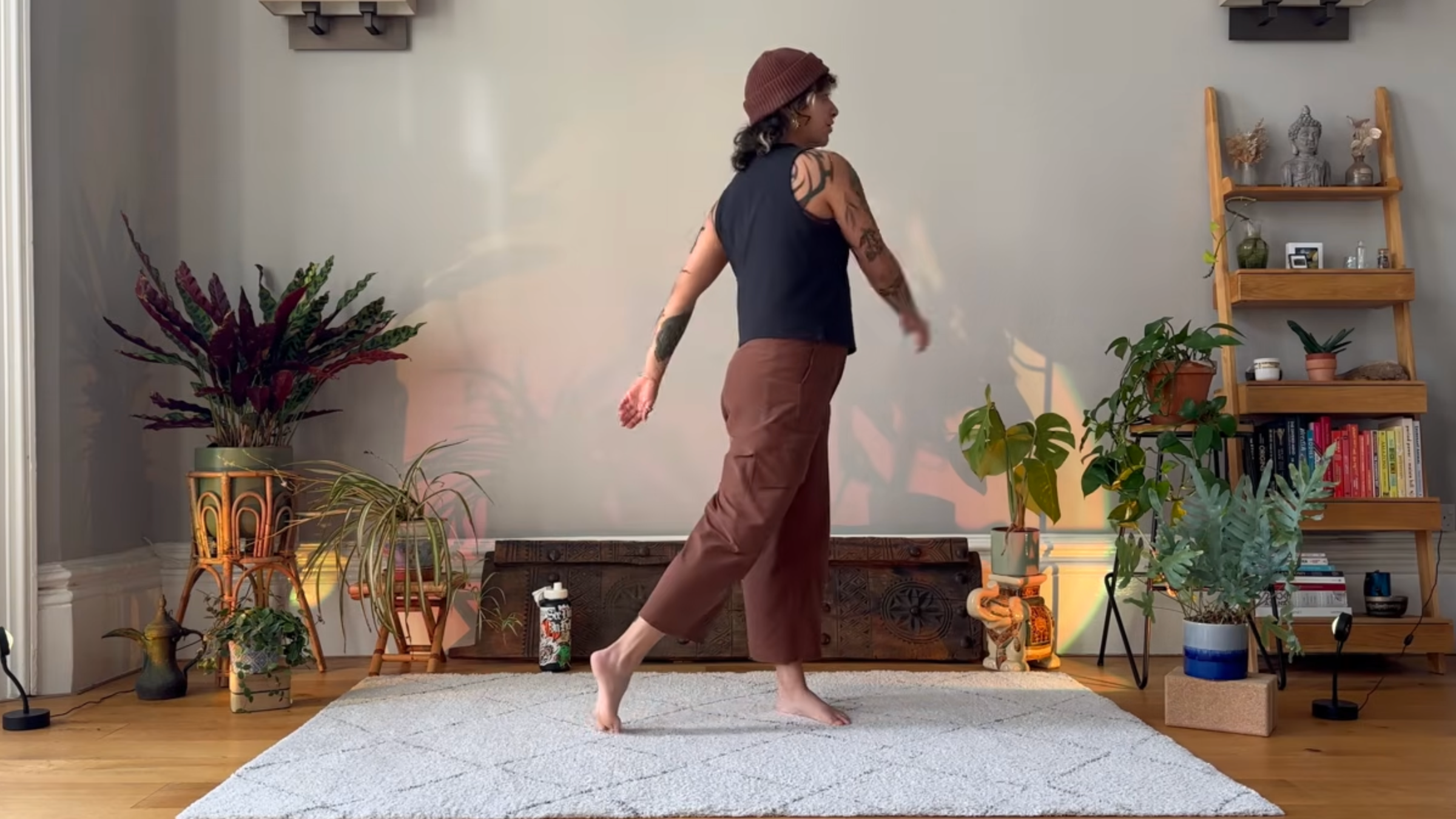 Yoga teacher Olive Walton practicing spinal rotations.