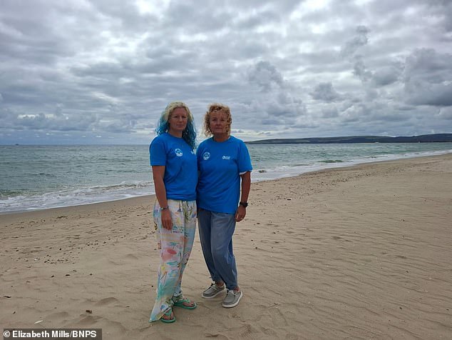 East Dorset Open Water Swimming Club have blamed Wessex Water for sewage discharges off Blue Flag beach in Poole, Dorset, following heavy rain (swimmers are pictured)