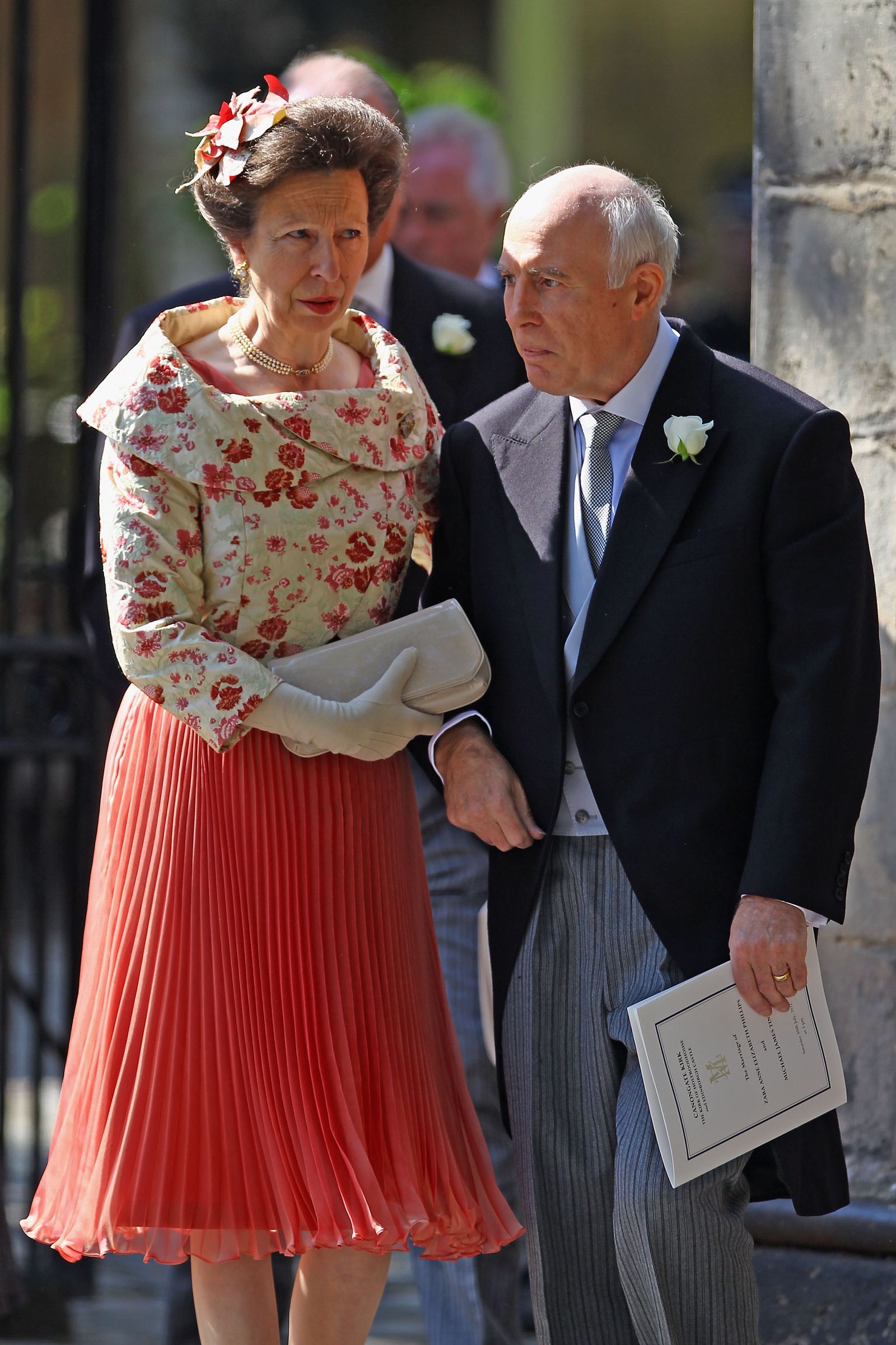Image may contain Hans Werner Henze Anne Princess Royal Person Clothing Glove Adult Formal Wear Suit and Wedding