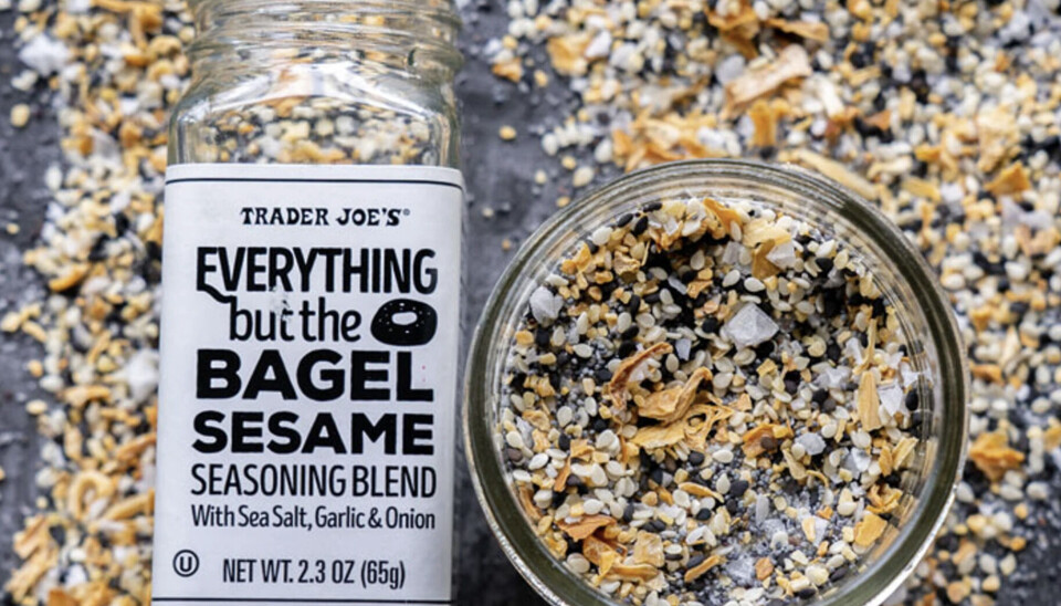 Trader Joe’s seasoning jar and dish of sesame blend surrounded by scattered spices.