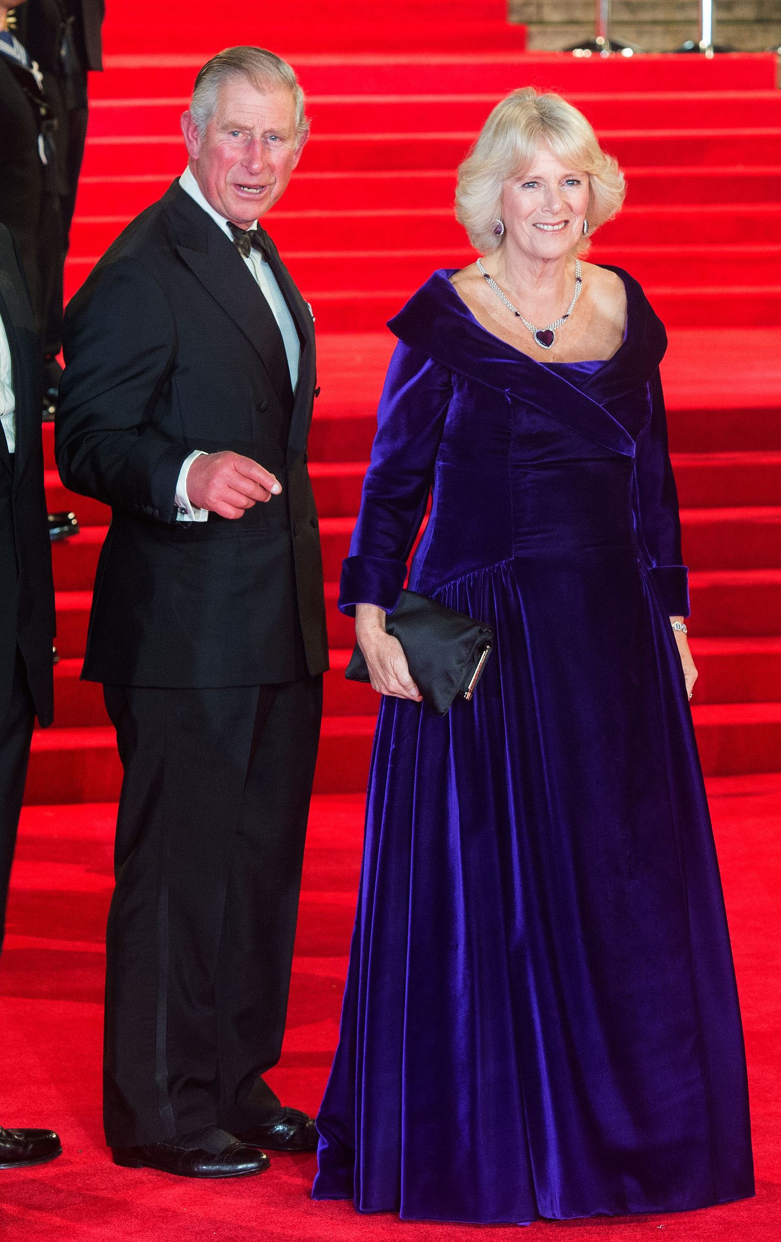 Image may contain Charles Prince of Wales Fashion Person Adult Clothing Coat Premiere Red Carpet and Formal Wear