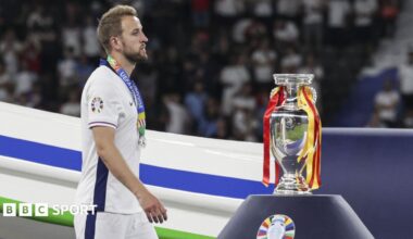 Harry Kane walks past Euro 2024 trophy after England lose final to Spain