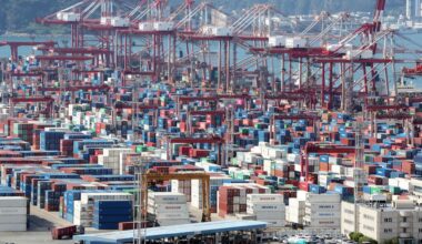 Containers bound for export are stacked at a port in Busan, Aug. 6. Yonhap