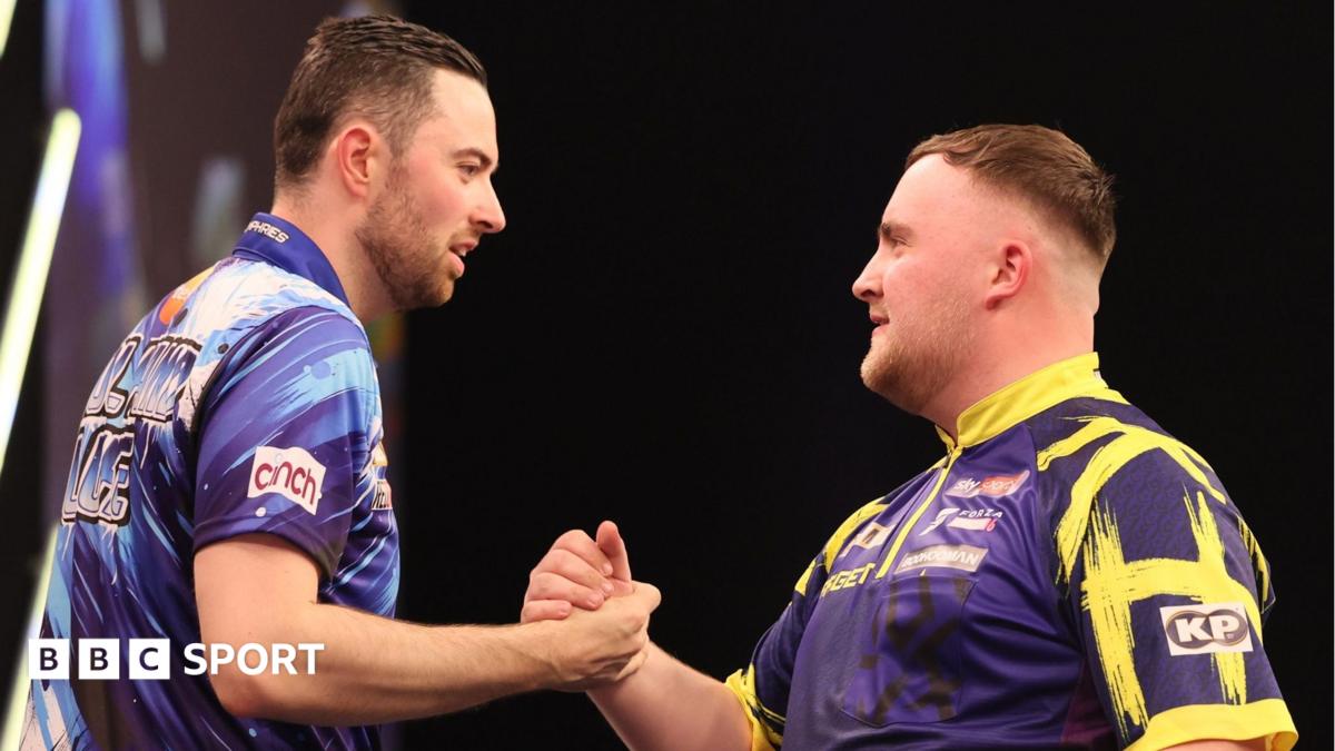 Luke Humphries (left) and Luke Littler clasp hands