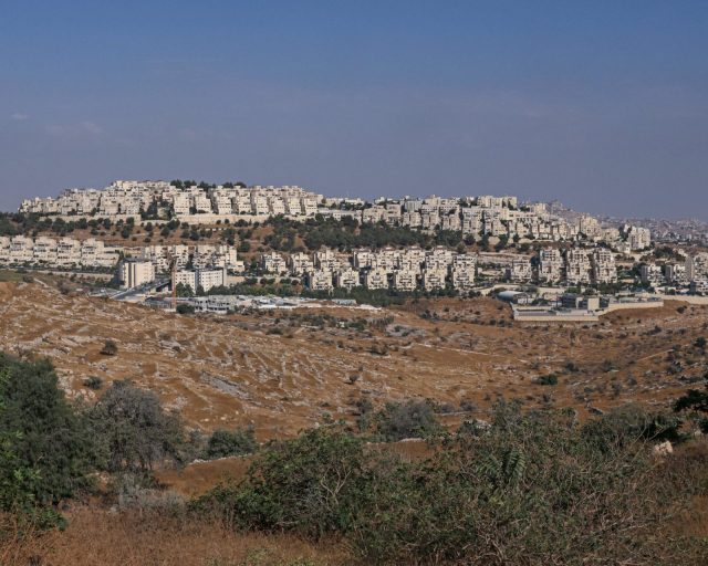 The Israeli settlement of Har Homa, backdropped by the Israeli-occupied Palestinian West Bank city of Bethlehem (R), is seen in the Israel-annexed East Jerusalem on August 14, 2026. (Photo by AHMAD GHARABLI / AFP via Getty Images)